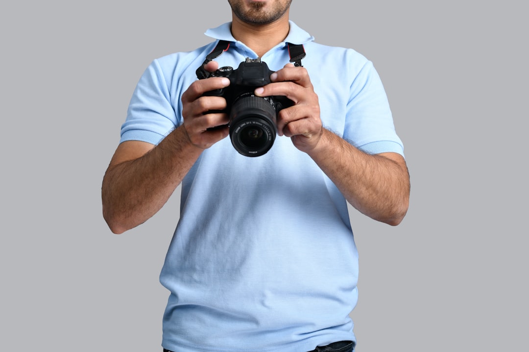 a man holding a camera