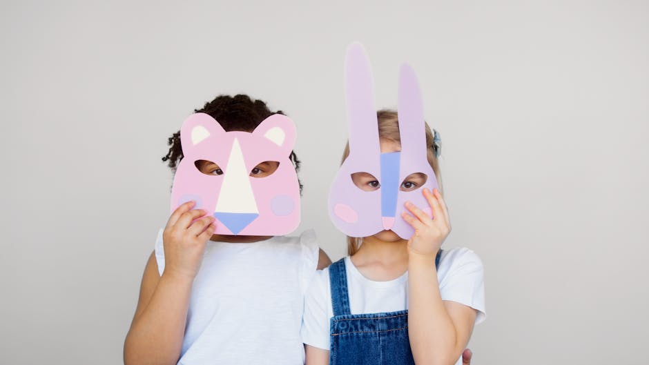 Two children wearing playful animal masks, showcasing creativity and imagination indoors.