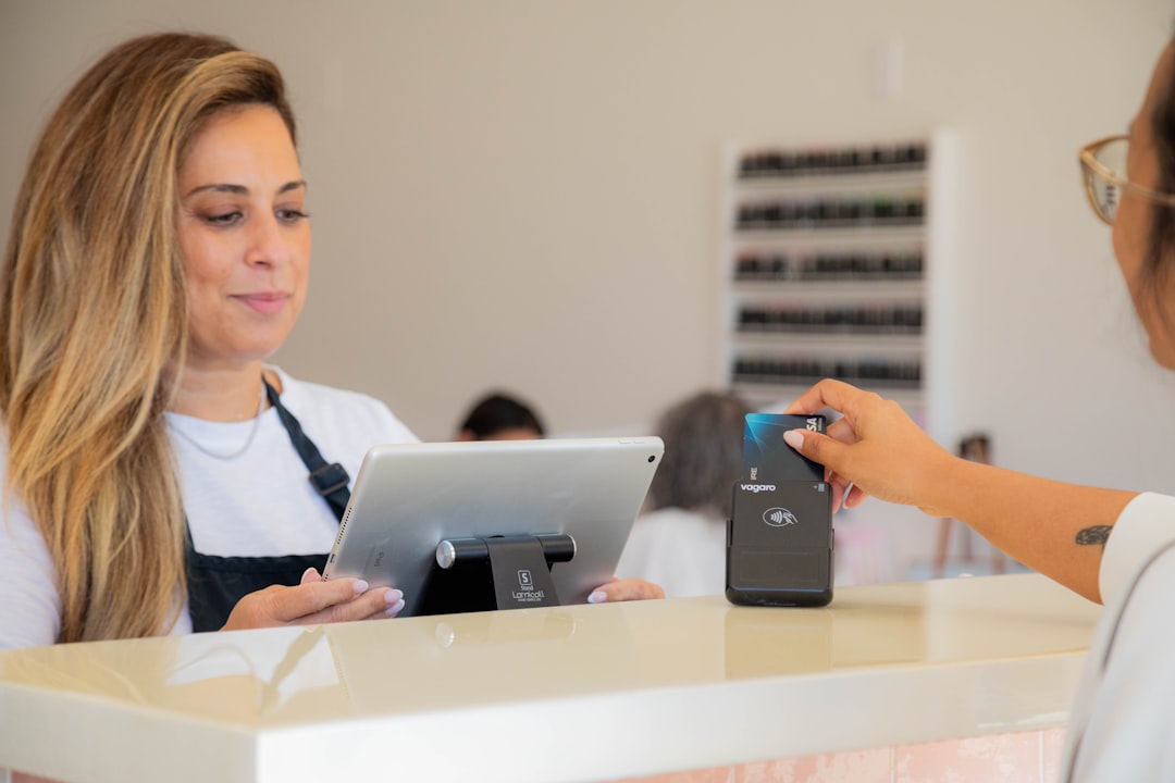 A woman is making a card payment.